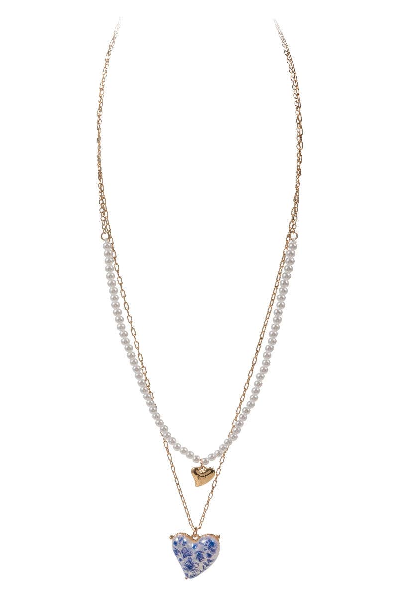Necklace with heart-shaped pendants on a white background