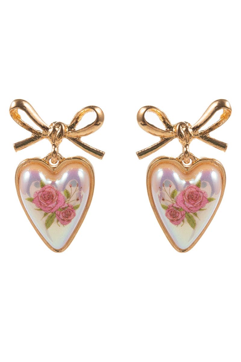 Heart-shaped earrings with floral design and gold bows on a white background