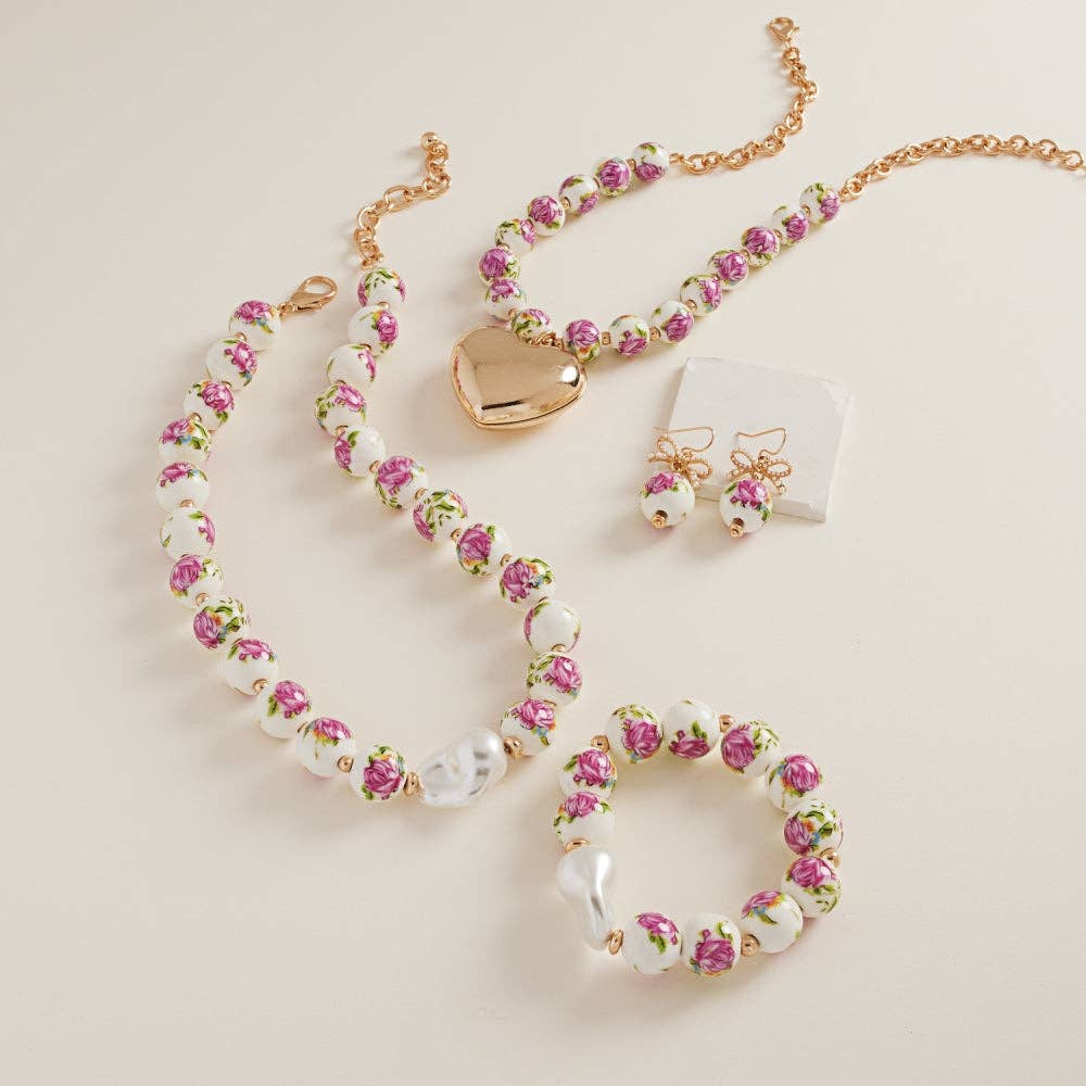 Ceramic beads with organic-shaped pearl charm bracelet by Designature New York, featuring natural stone and pearl accents.
