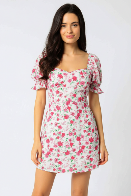 Essecoco Adeline floral halter dress in pink, showing back view with vibrant floral pattern and halter neckline.