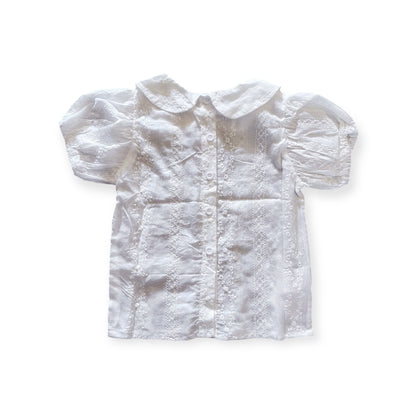 Sweet ivory girls' top with embroidered collar by essécoCo, featuring delicate embroidery and a stylish, comfortable design.